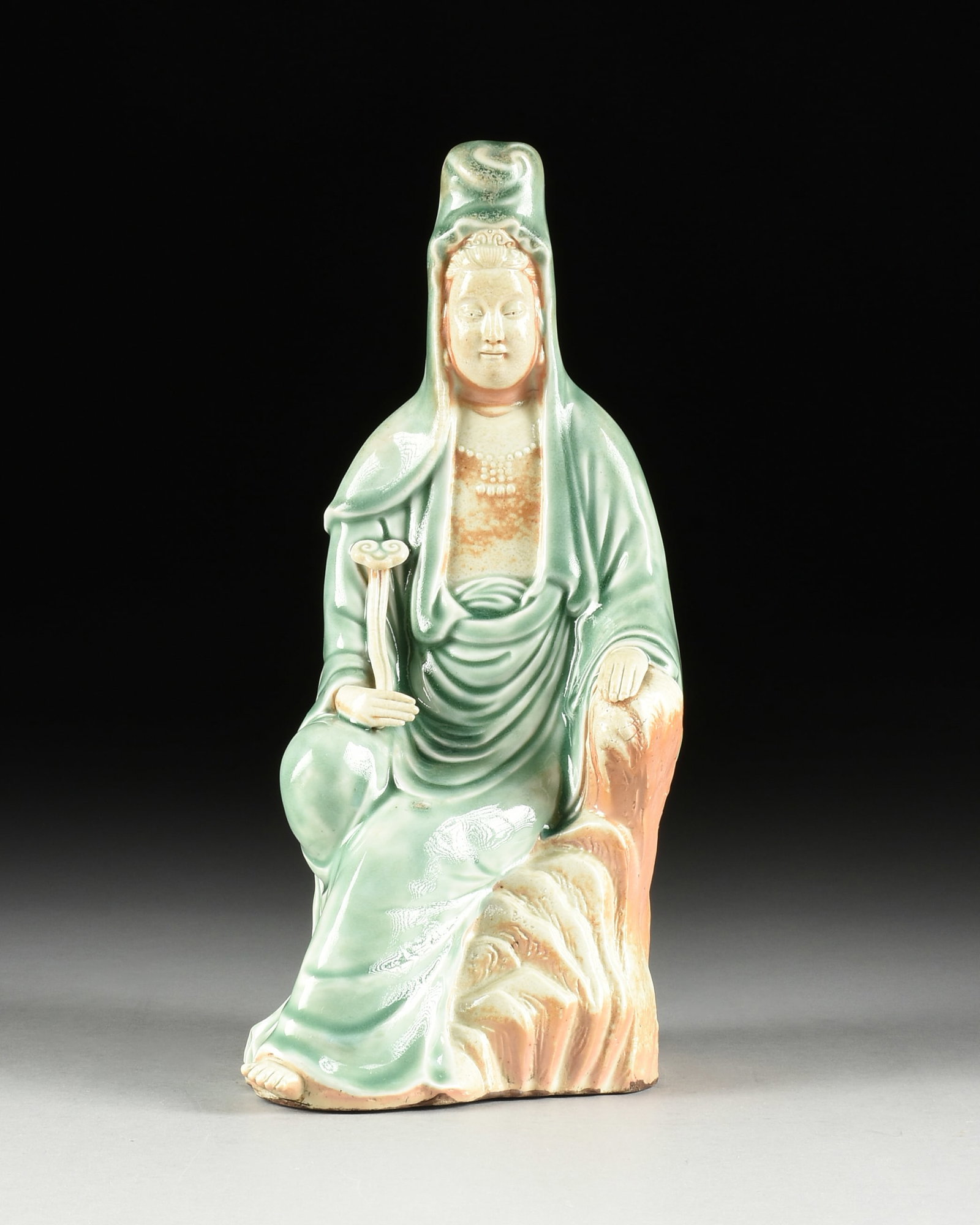 A CELADON GLAZED GUANYIN, CHINESE, 19TH/20TH CENTURY, (1 of 11)