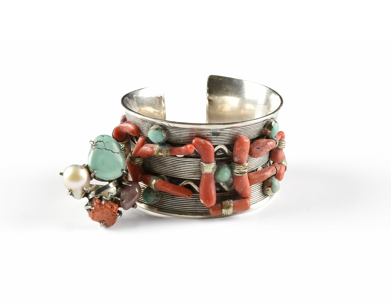 A SILVER, TURQUOISE, AND CORAL CUFF BRACELET AND RING SET, 20TH CENTURY,: A SILVER, TURQUOISE, AND CORAL CUFF BRACELET AND RING SET, 20TH CENTURY, a two-piece set comprised of a Moroccan coin silver cuff bracelet decorated with turquoise cabochons and coral (with assay mark