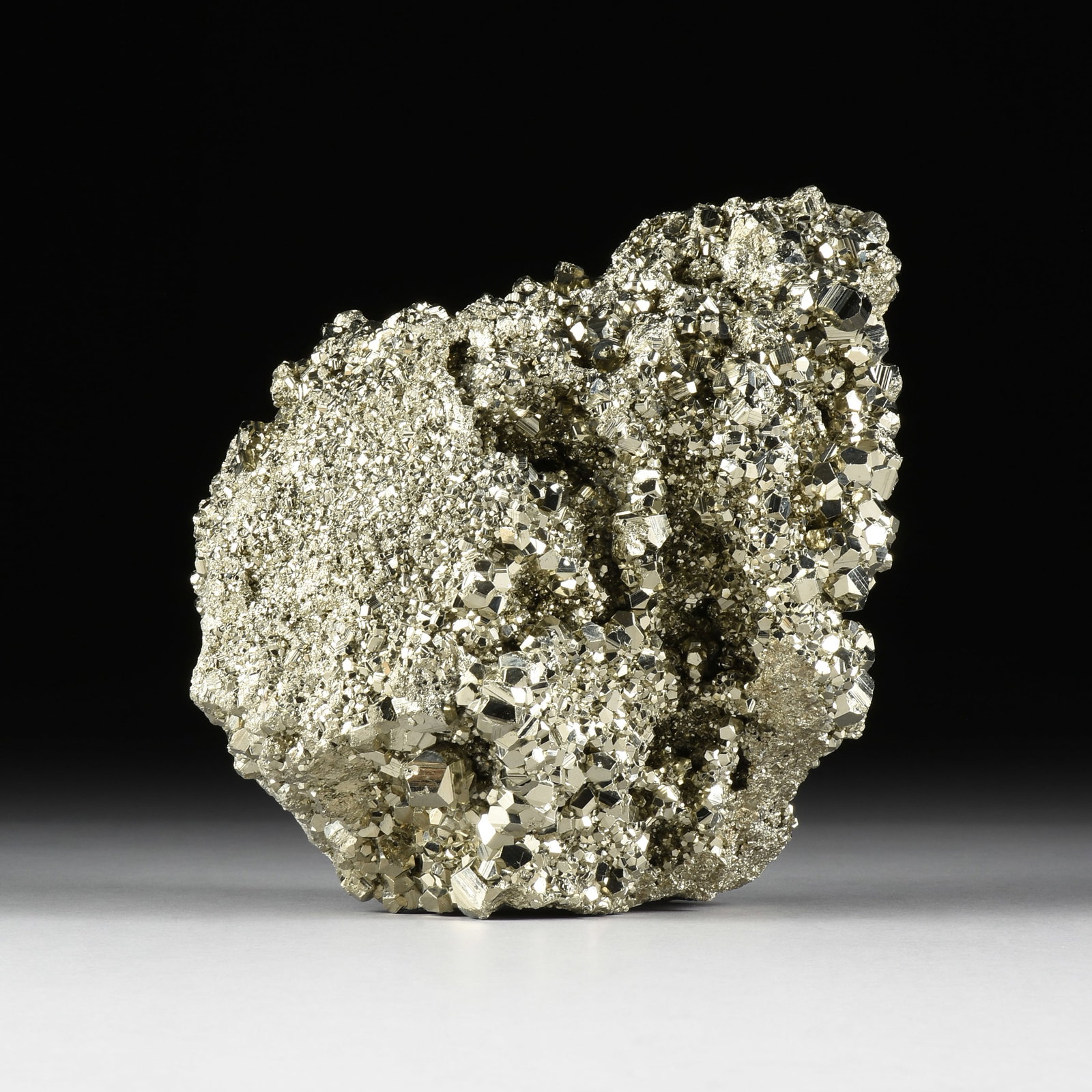 A PYRITE SPECIMEN, PERU,: A PYRITE SPECIMEN, PERU, a pyrite formation from the Huanzala mine in Peru. Total approximate weight: 23 lbs. View 360° …</