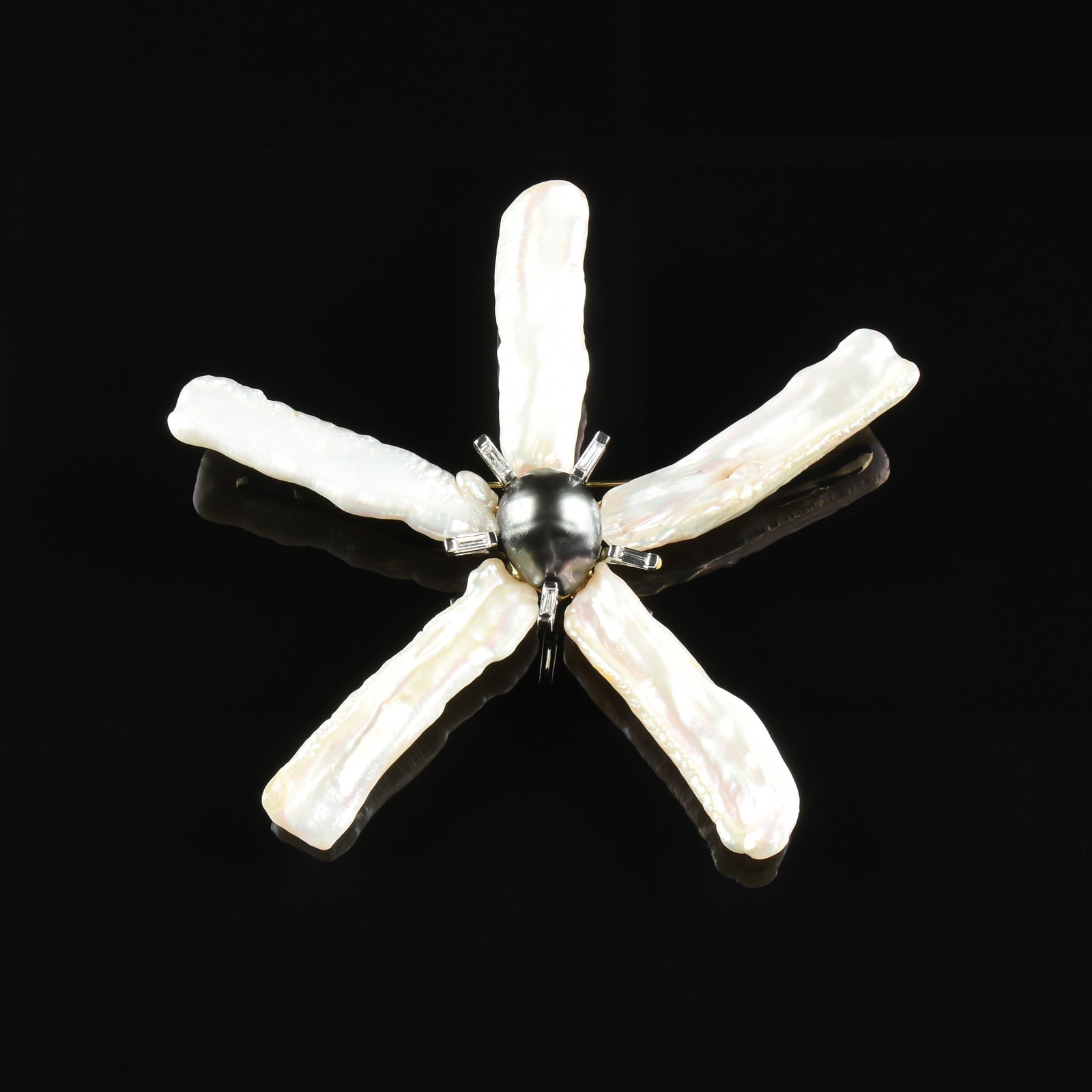 AN 18K GOLD, PEARL, AND DIAMOND FLOWER BROOCH,: AN 18K GOLD, PEARL, AND DIAMOND FLOWER BROOCH, 18k yellow gold brooch with five biwa petal pearls, and five baguette cut diamond surrounding a central black Tahitian pearl. Total approximate weight: 5