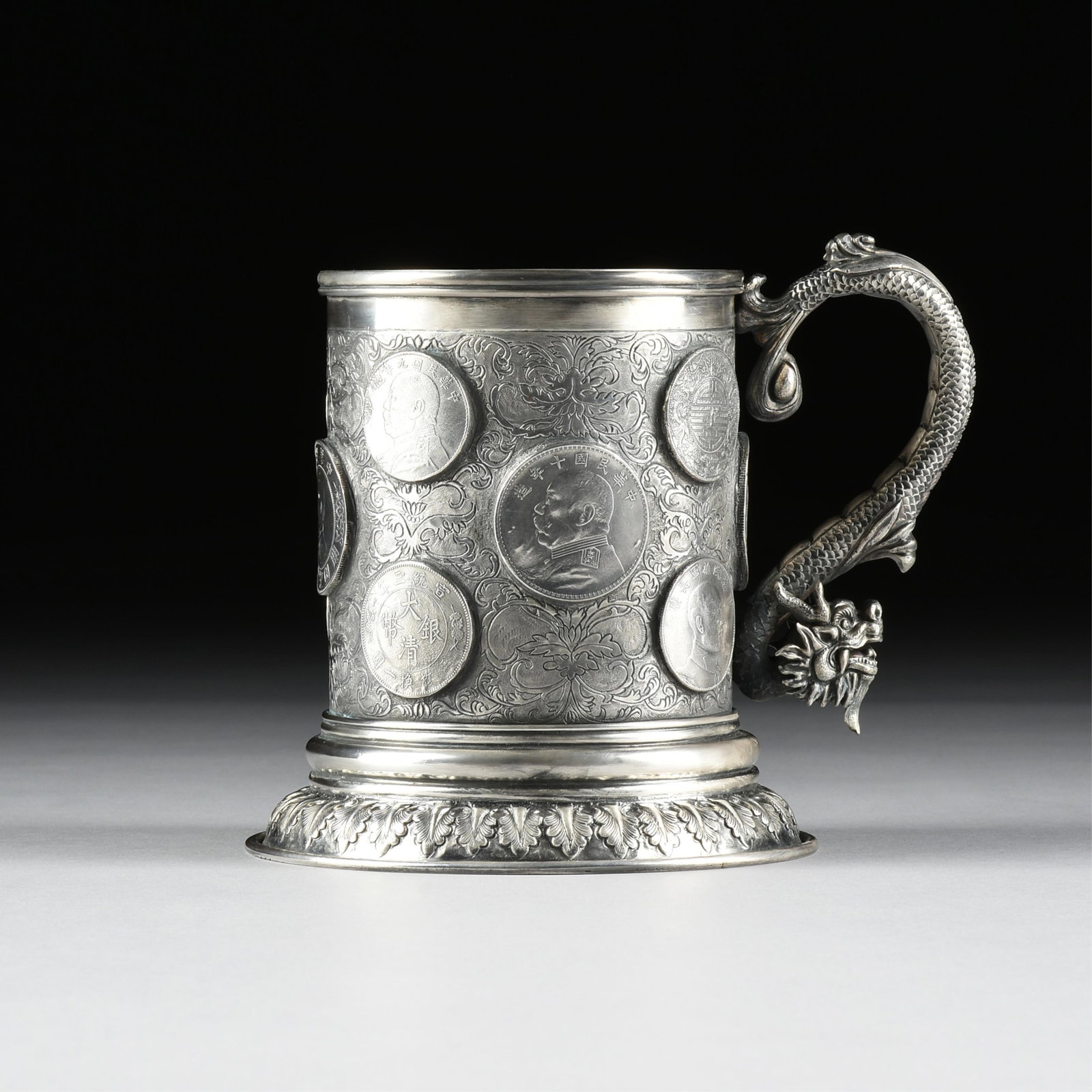 A LEECHING COIN SILVER TANKARD, CHINESE EXPORT, EARLY 20TH CENTURY, (1 of 10)
