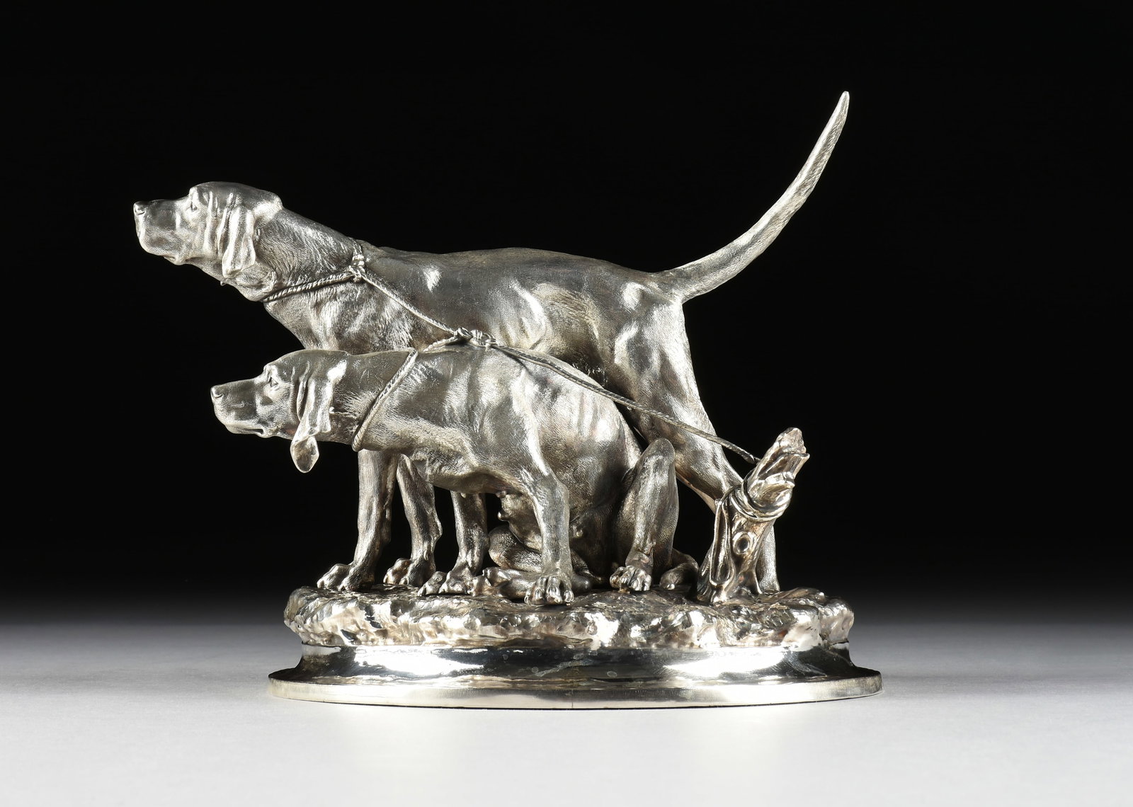 A STERLING SILVER DOGS SCULPTURE, BRITISH, 1886, (1 of 10)