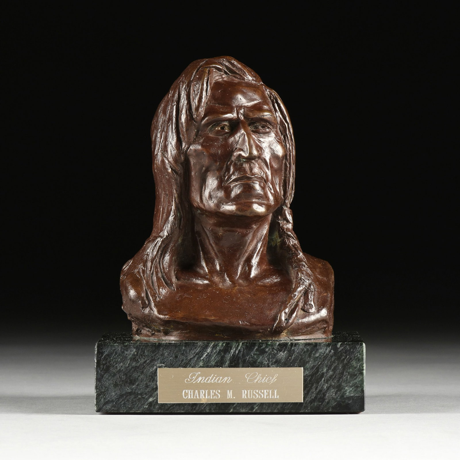 after CHARLES MARION RUSSELL (American 1864-1926) Indian Chief, 1972,: after CHARLES MARION RUSSELL (American 1864-1926) Indian Chief, 1972, bronze with chocolate brown patina on a green marble base, inscribed at right, "CMR," with the skull cipher, inscribed at on the