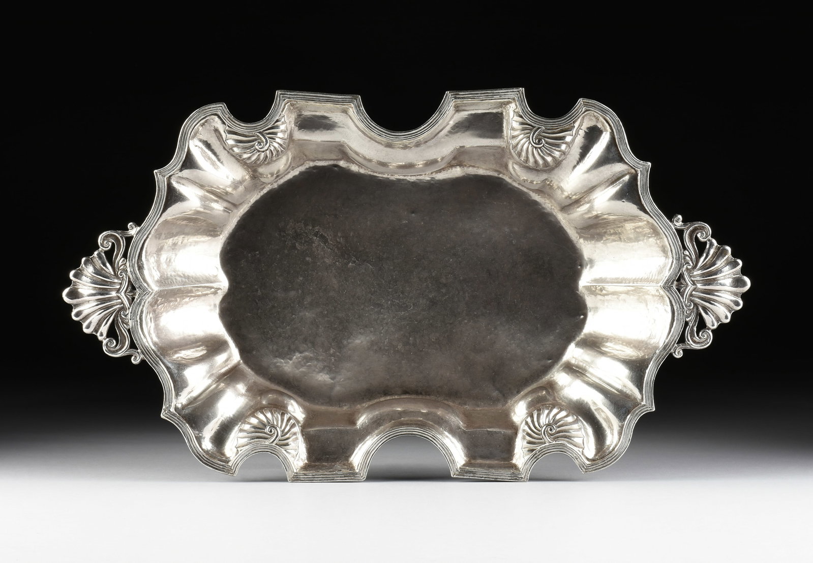 A BAROQUE STYLE COIN SILVER BASIN, PROBABLY MEXICAN, 20TH CENTURY, (1 of 7)