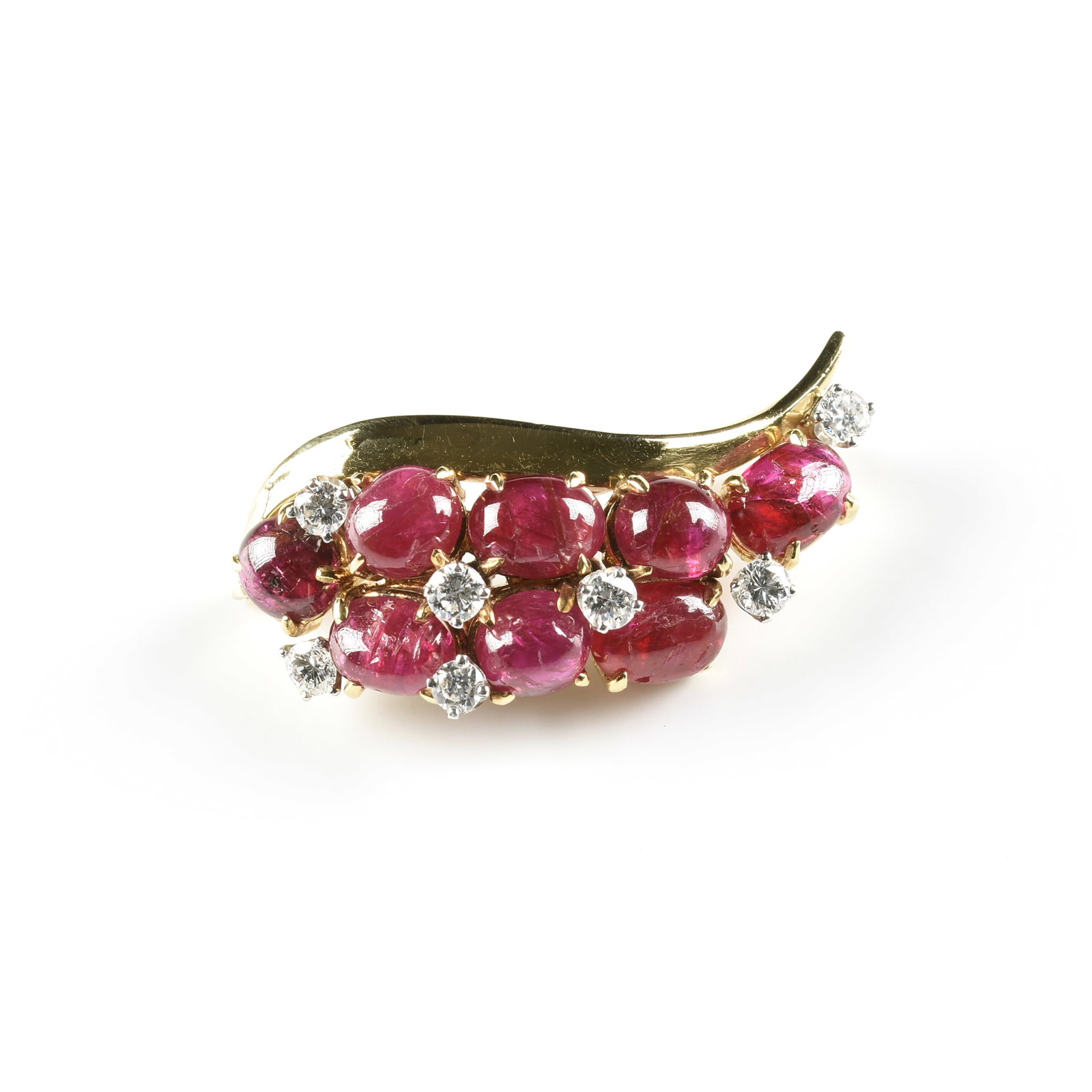 AN 18K GOLD, RUBY, AND DIAMOND BROOCH, 20TH CENTURY,: AN 18K GOLD, RUBY, AND DIAMOND BROOCH, 20TH CENTURY, 18k yellow gold brooch set with eight ruby cabochons (5 - 6 mm) and seven round cut diamonds (approximately 2.8 mm). Total approximate weight: 7.9 
