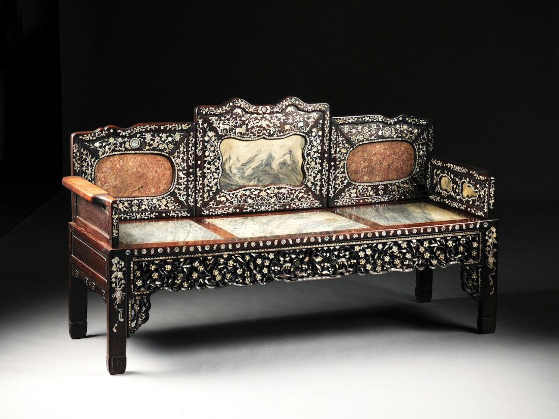 A CHINESE EXPORT MOTHER-OF-PEARL AND MARBLE INLAID CARV: A CHINESE EXPORT MOTHER-OF-PEARL AND MARBLE INLAID CARVED HARDWOOD BENCH, REPUBLIC PERIOD (1912-1949), the shaped rectangular back rest with recessed panels enclosing inlaid butterflies, bats, birds a