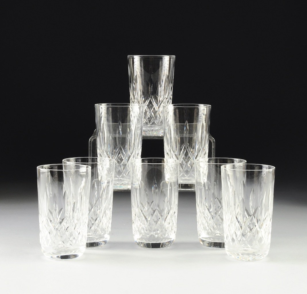 A SET OF EIGHT WATERFORD CLEAR CRYSTAL TUMBLERS IN THE: A SET OF EIGHT WATERFORD CLEAR CRYSTAL TUMBLERS IN THE LISMORE PATTERN, 20TH CENTURY, with acid etched Waterford mark to base. Height: 5" Diameter: 2 7/8" Estimate: $400.00 - $600.00