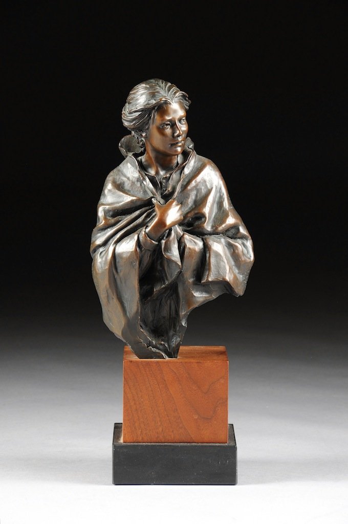 GLENNA GOODACRE (American/Texas b. 1939) A PATINATED BR: GLENNA GOODACRE (American/Texas b. 1939) A PATINATED BRONZE SCULPTURE, "Hope," signed in the bronze, numbered 21/25, raised on a rectangular carved wood pedestal. Purchased from Meinhard Galleries, In