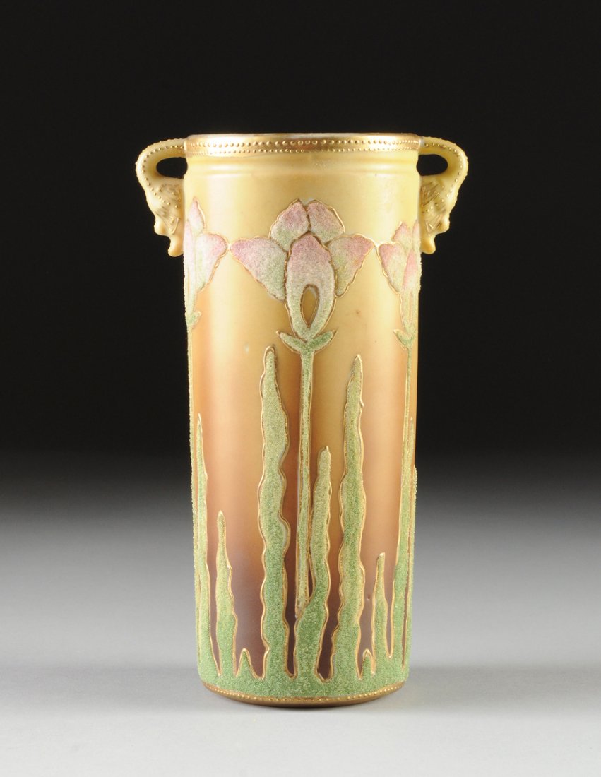 A NIPPON CORALENE DECORATED TWO-HANDLED VASE, OVERGLAZE: A NIPPON CORALENE DECORATED TWO-HANDLED VASE, OVERGLAZE MAKER'S PUCE MARKS, US PATENT NUMBER 912171., FEBRUARY 9, 1909, the cylindrical body centering sides with polychrome glass beaded long stem flow
