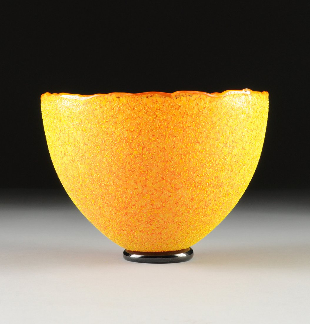 A KOSTA BODA YELLOW ART GLASS BOWL, BY BERTIL VALLIEN,: A KOSTA BODA YELLOW ART GLASS BOWL, BY BERTIL VALLIEN, ENGRAVED MAKER'S MARK AND ARTIST'S SIGNATURE, NUMBERED 7050315, CONTEMPORARY, of tapering circular form, with a shaped rim above a transparent or
