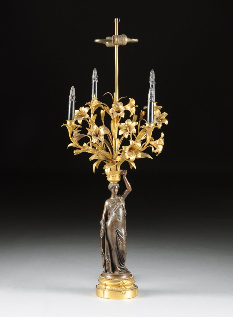 LOUIS VALENTIN ELIAS ROBERT (French 1821-1874) A: LOUIS VALENTIN ELIAS ROBERT (French 1821-1874) A PATINATED BRONZE FIGURE OF A CLASSICAL MAIDEN, THIRD QUARTER 19TH CENTURY, nicely cast as a classically attired maiden carrying a blossoming lilies fil