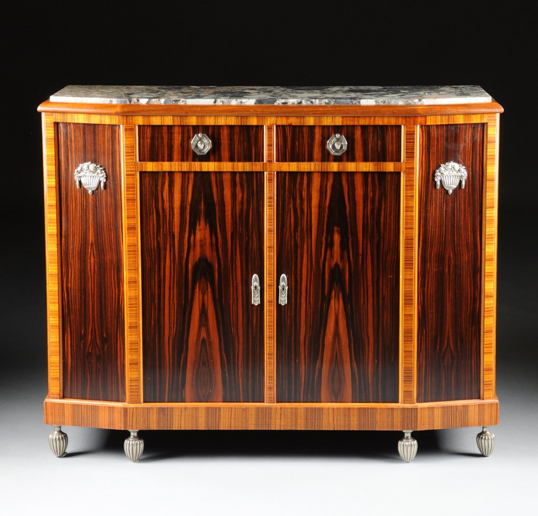 AN ART DECO MARBLE TOPPED AND SILVERED BRONZE MOUNTED: AN ART DECO MARBLE TOPPED AND SILVERED BRONZE MOUNTED ROSEWOOD SIDEBOARD CABINET WITH ZEBRA WOOD CROSSBANDING, BRONZES INCISED "CL," NUMBERED 36, EARLY 20TH CENTURY, the rectangular charcoal gray and 