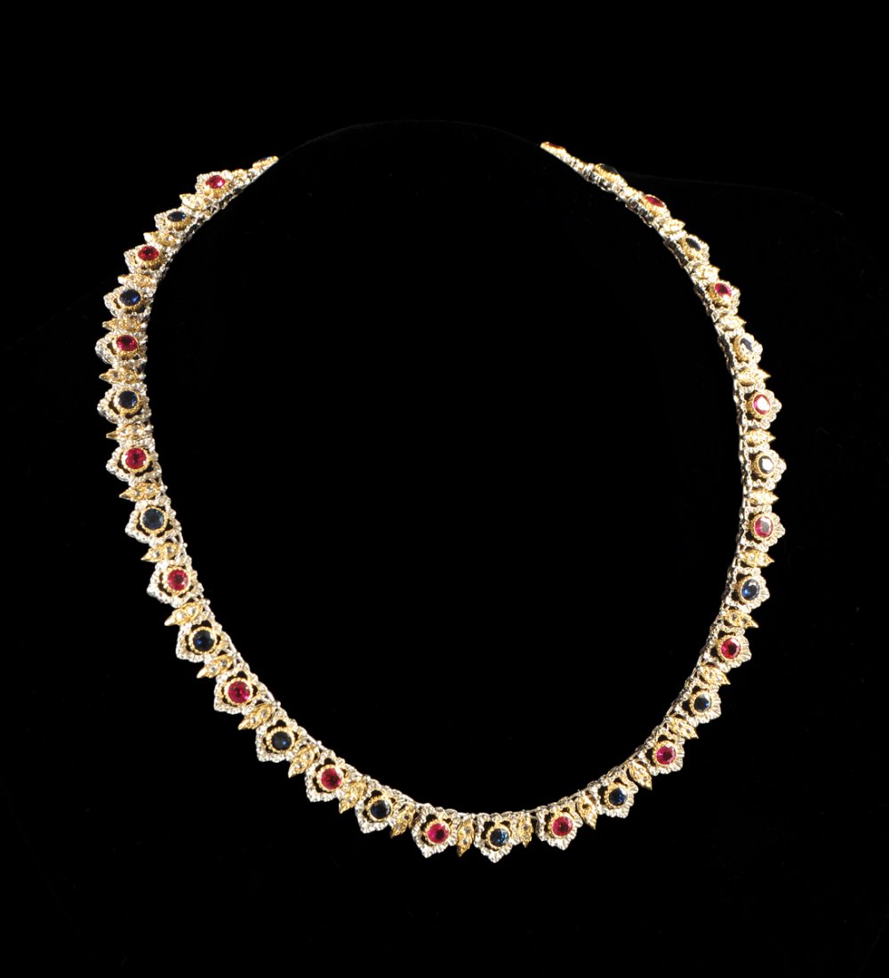 AN 18K WHITE AND YELLOW GOLD, DIAMOND, RUBY, AND: AN 18K WHITE AND YELLOW GOLD, DIAMOND, RUBY, AND SAPPHIRE BUCCELLATI LADY"S NECKLACE, signed “Buccellati 18K.” Buccellati Jewelers of Milano (1919-present) created this classic textural 16” chok