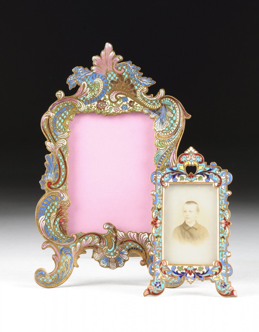TWO FRENCH POLYCHROME CHAMPLEVÉ BRONZE PHOTOGRAPH: TWO FRENCH POLYCHROME CHAMPLEVÉ BRONZE PHOTOGRAPH PICTURE FRAMES, LATE 19TH/EARLY 20TH CENTURY, one in the Rococo Revival style with a rectangular frame of foliate "C" scrolls, trellis panels, and st