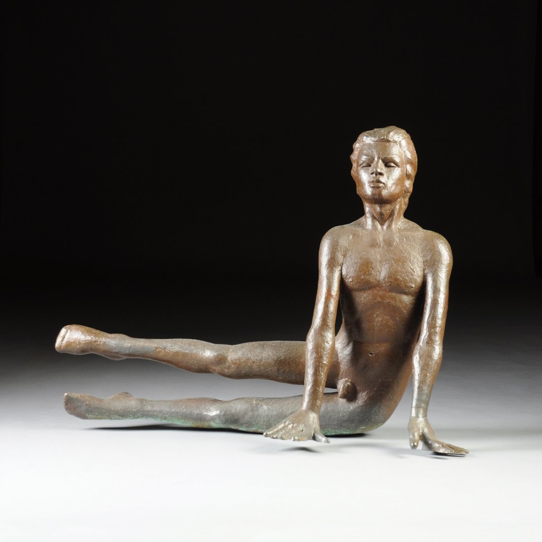 VICTOR SALMONES (Mexican, 1937-1989) A PATINATED: VICTOR SALMONES (Mexican, 1937-1989) A PATINATED BRONZE FIGURE OF A NUDE YOUTH, naturalistically modeled with the boy in stretching position, signed and numbered 7/10 Height: 32 1/2" Width: 45" Depth: