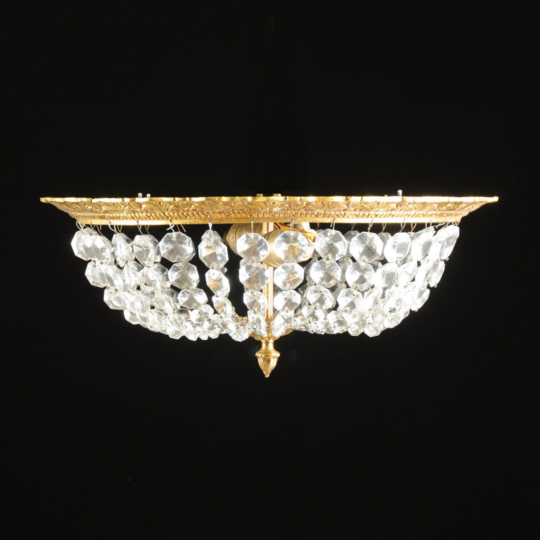 A PAIR OF NEO CLASSICAL REVIVAL STYLE CUT GLASS MOUNTED: A PAIR OF NEO CLASSICAL REVIVAL STYLE CUT GLASS MOUNTED GILT BRASS CEILING LIGHT FIXTURES, MODERN, each of circular form and having an acanthus leaf and shield cast frame suspending strands of graduat