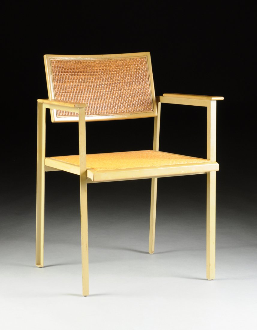 GEORGE NELSON & ASSOCIATES / IRVING HARPER (American b.: GEORGE NELSON & ASSOCIATES / IRVING HARPER (American b. 1916) A STEEL, BIRCH, AND CANE ARMCHAIR, MODEL 5089, FOR HERMAN MILLER, INC., ZEELAND, MICHIGAN, DESIGNED 1950, PRODUCED CIRCA 1955, the frame o