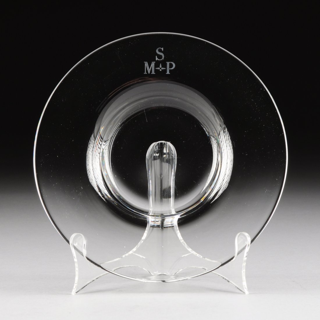 A SET OF EIGHTEEN STEUBEN GLASS WORKS DESSERT PLATES,: A SET OF EIGHTEEN STEUBEN GLASS WORKS DESSERT PLATES, MODEL 7930, CORNING NEW YORK, CIRCA 1950, comprising eight 1/2" deep plates monogrammed "MSP;" six 1/2" deep plates without monogram, and six 3/4"
