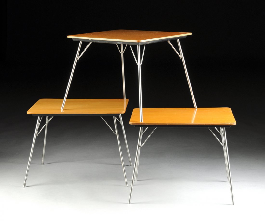 CHARLES AND RAY EAMES (American 1907-1978/1912-1988) A: CHARLES AND RAY EAMES (American 1907-1978/1912-1988) A GROUP OF THREE BIRCH PLYWOOD, CHROME PLATED STEEL AND RUBBER CHILDREN'S FOLDING TABLES, MODEL IT-1, FOR HERMAN MILLER, INC., ZEELAND, MICHIGAN, D