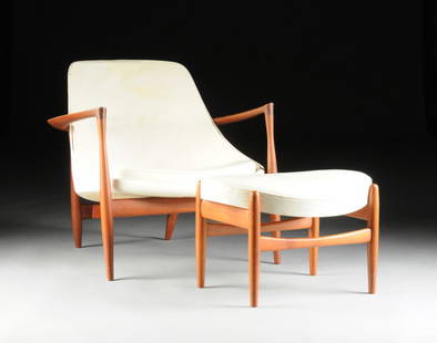 IB KOFOD-LARSEN (Danish 1921-2003) A ROSEWOOD AND: IB KOFOD-LARSEN (Danish 1921-2003) A ROSEWOOD AND LEATHER "ELIZABETH" LOUNGE CHAIR AND OTTOMAN, MODEL U-56, FOR CHRISTENSEN & LARSEN, COPENHAGEN, DENMARK, DESIGNED AND PRODUCED CIRCA 1956, with an ova