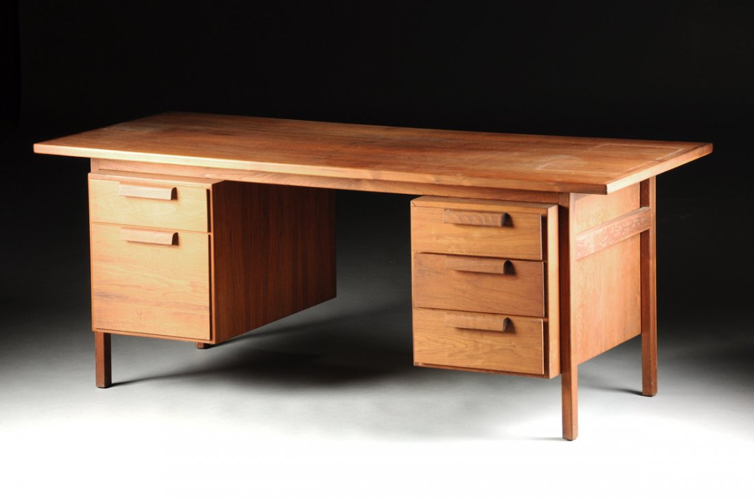 JENS RISOM (Danish/American b. 1916) "GROUP 8" WALNUT: JENS RISOM (Danish/American b. 1916) "GROUP 8" WALNUT DOUBLE PEDESTAL SECRETARY'S DESK, FOR JENS RISOM DESIGNS, INC., 1957, with linseed oil finish, the left pedestal of two drawers, the upper with pe