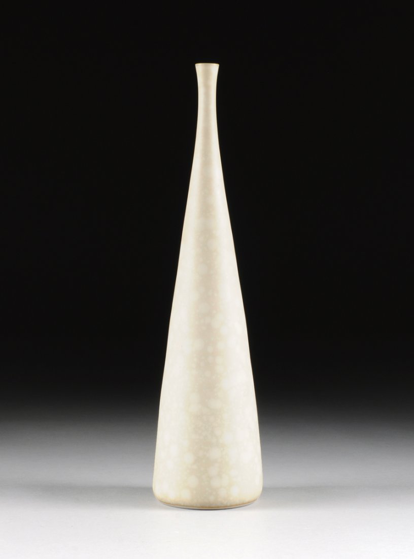 CARL HARRY STALHANE (Swedish 1920-1990) A CRYSTALLINE: CARL HARRY STALHANE (Swedish 1920-1990) A CRYSTALLINE GLAZED STONEWARE VASE FOR RORSTRAND, LIDKOPING, SWEDEN, CIRCA 1955, of tapered bottle form with matte cream crystalline glaze, with 3 crowns incis