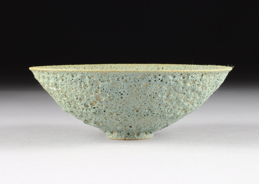 GERTRUD AND OTTO NATZLER (American 1908-1971/1908-2007): GERTRUD AND OTTO NATZLER (American 1908-1971/1908-2007) AN EARTHENWARE VASE WITH GREEN LAVASTONE GLAZE, LOS ANGELES, CALIFORNIA, CIRCA 1955, of conical form with ring shaped foot, marks: "NATZLER" in