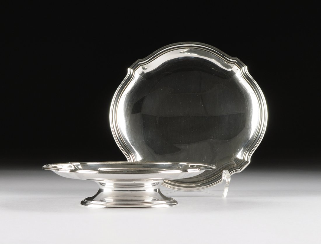 A PAIR OF GUSTAVE KELLER 950 STANDARD SILVER FOOTED: A PAIR OF GUSTAVE KELLER 950 STANDARD SILVER FOOTED TAZZAS, PARIS, FRANCE, CIRCA 1900, of bracketed circular form raised on spreading conforming foot, marked to the bottom (G. KELLER, PARIS, MADE IN F
