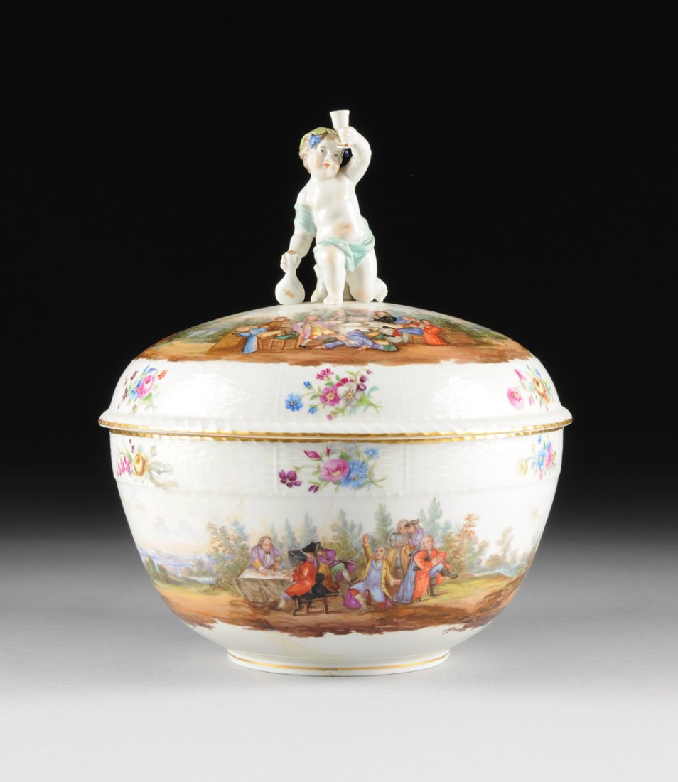 A BERLIN POLYCHROME PAINTED PORCELAIN LIDDED PUNCH: A BERLIN POLYCHROME PAINTED PORCELAIN LIDDED PUNCH BOWL, UNDERGLAZE BLUE SCEPTER AND IMPRESSED MARKS, 19TH CENTURY, the tapering circular bowl with gilt line rim above basket weave molded decoration c