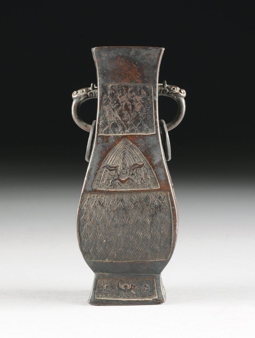 A CHINESE ARCHAISTIC STYLE PATINATED BRONZE TWIN (1 of 8)