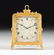 A SWISS GILT AND SILVERED ENGRAVED BRASS STRUT CLOCK,