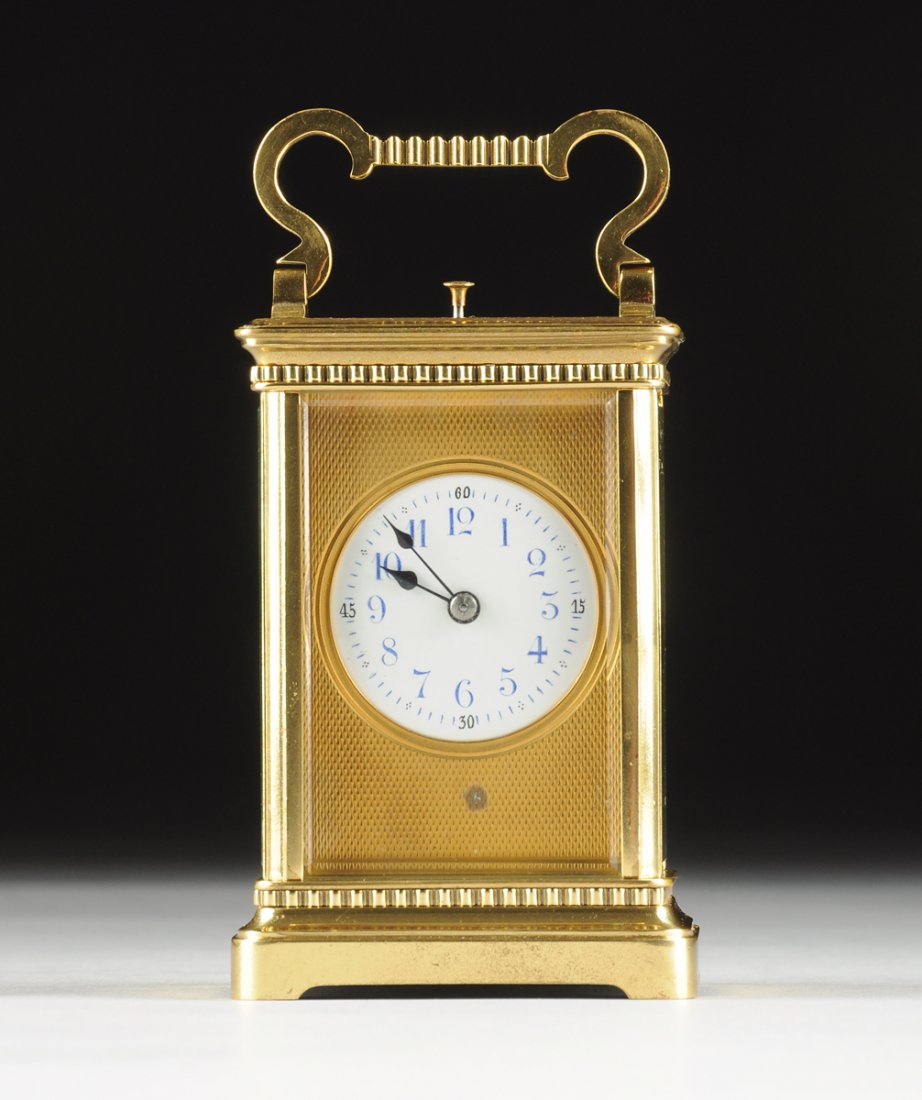 A POLISHED BRASS CARRIAGE CLOCK, POSSIBLY FRENCH, LATE (1 of 7)