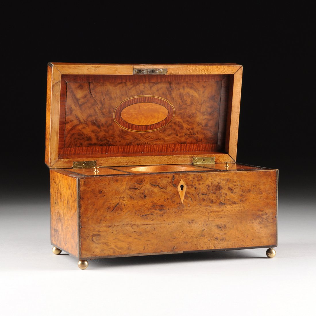 A REGENCY ERA EBONY TRIMMED AND BURL AMBOYNA INLAID TEA (1 of 10)
