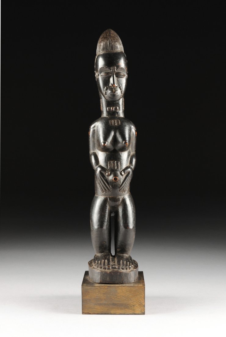 A BAULE CARVED WOOD STANDING FEMALE FIGURE, IVORY (1 of 10)