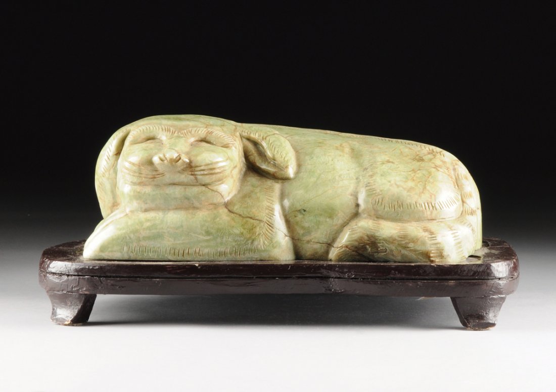 A LARGE CHINESE GREEN JADE FIGURE OF A RECUMBENT DOG, (1 of 8)