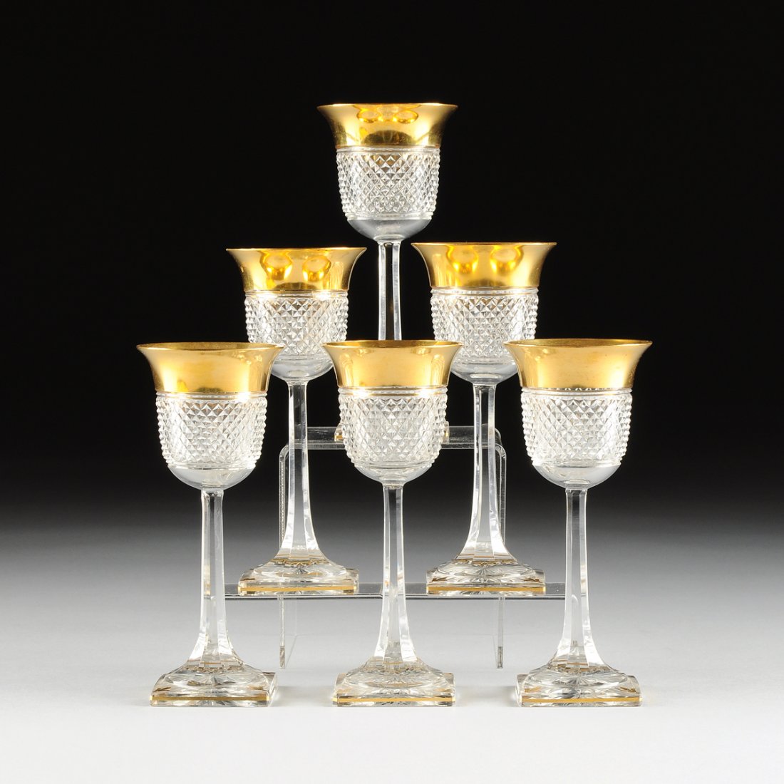 A SET OF SIX CONTINENTAL PARCEL GILT CRYSTAL STEMMED (1 of 6)
