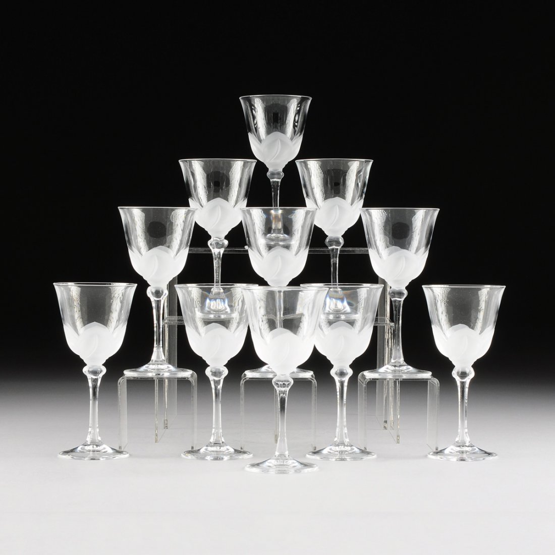 A SET OF TWELVE CRISTAL D'ARQUES-DURAND SATINE FROSTED: A SET OF TWELVE CRISTAL D'ARQUES-DURAND SATINE FROSTED AND CLEAR CRYSTAL WINE GOBLETS, "FLORENCE" PATTERN, 20TH CENTURY, each with a clear bowl cradled by a frosted stylized lily bulb leading to a cle