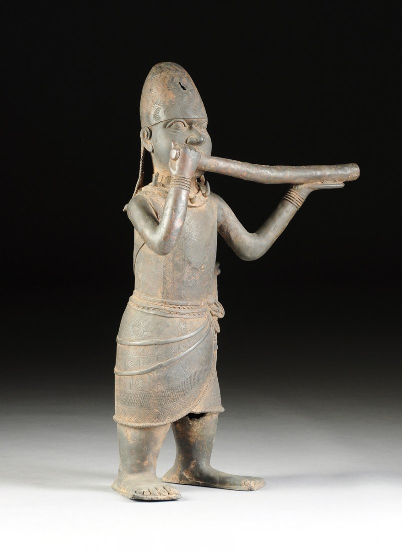 A BENIN BRONZE FIGURE OF A MUSICIAN WITH FLUTE, 20TH (1 of 10)