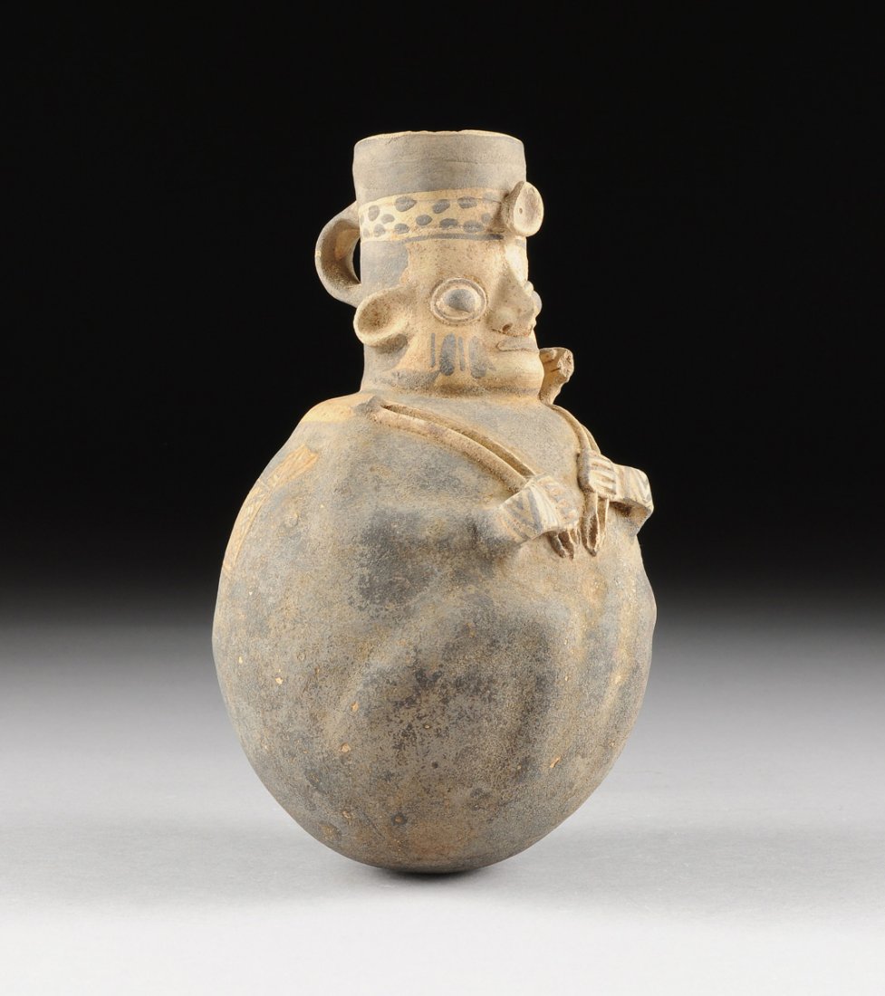 A PRE- COLUMBIAN ANTHROPOMORPHIC URN, CHANCAY, PERU, (1 of 10)