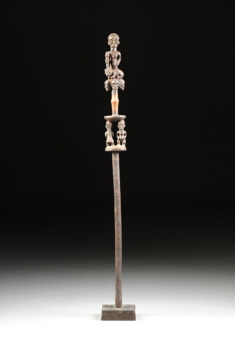 AN AFRICAN TRIBAL CARVED WOOD TWO TIERED STAFF, (1 of 10)