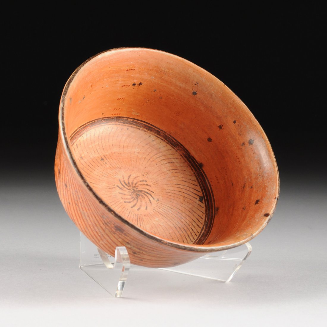 A PRE-COLUMBIAN POTTERY BOWL, MAYAN, POSSIBLY ULUA VALL: A PRE-COLUMBIAN POTTERY BOWL, MAYAN, POSSIBLY ULUA VALLEY, GUATEMALA, 550 A.D.- 950 A.D., of slightly flared form, the entire exterior is painted with thin lines, the interior centering a starburst sh