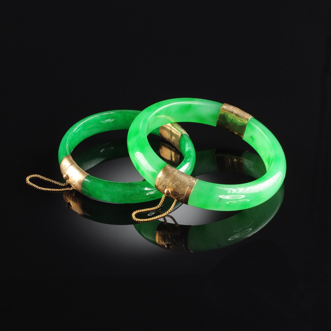 A GROUP OF TWO CHINESE JADE BANGLES WITH GOLD CLASPS, (1 of 1)