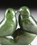 AN INUIT CARVED SPINACH JADE GROUP OF LOVE BIRDS - 5