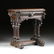 A RENAISSANCE REVIVAL CARVED WOOD SIDE TABLE, POSSIBLY