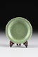 A CHINESE SMALL BARB RIMMED CELADON DISH, TOGETHER WITH - 2