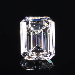 A PLATINUM AND 3.01 CT| VS2 DIAMOND GENT'S RING,: A PLATINUM AND 3.01 CT| VS2 DIAMOND GENT'S RING, the 10% iridium platinum gypsy mounting centering a 3.01 Cts. emerald cut diamond accompanied with a GIA Diamond Grading Report #2171742004 dated July