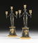 A PAIR OF LOUIS XVI STYLE GILT AND PATINATED BRONZE