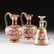 A THREE PIECE BOHEMIAN PARCEL GILT AND POLYCHROME