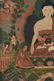A TIBETAN POLYCHROME PAINTED AND FRAMED THANGKA, - 7