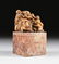 A CHINESE CARVED SOAPSTONE LAUGHING BUDDHA SEAL STAMP,